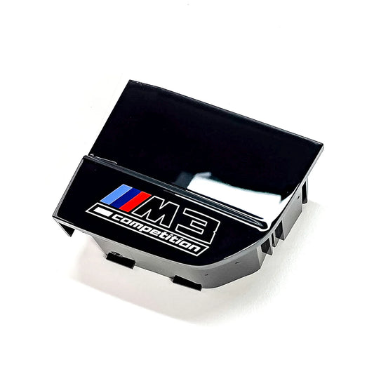 Gloss black centre console Trim unit with BMW M3 Competition badge for BMW G80 and G81 models.